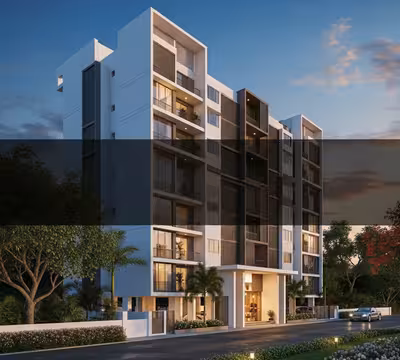 Exterior facade of the modern Balaji Emerald Heights apartment complex.