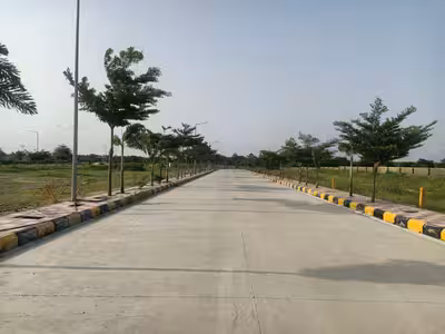 A well-maintained and sprawling open plot venture at Green Acres.